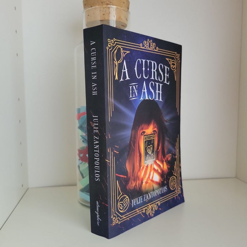 A Curse in Ash