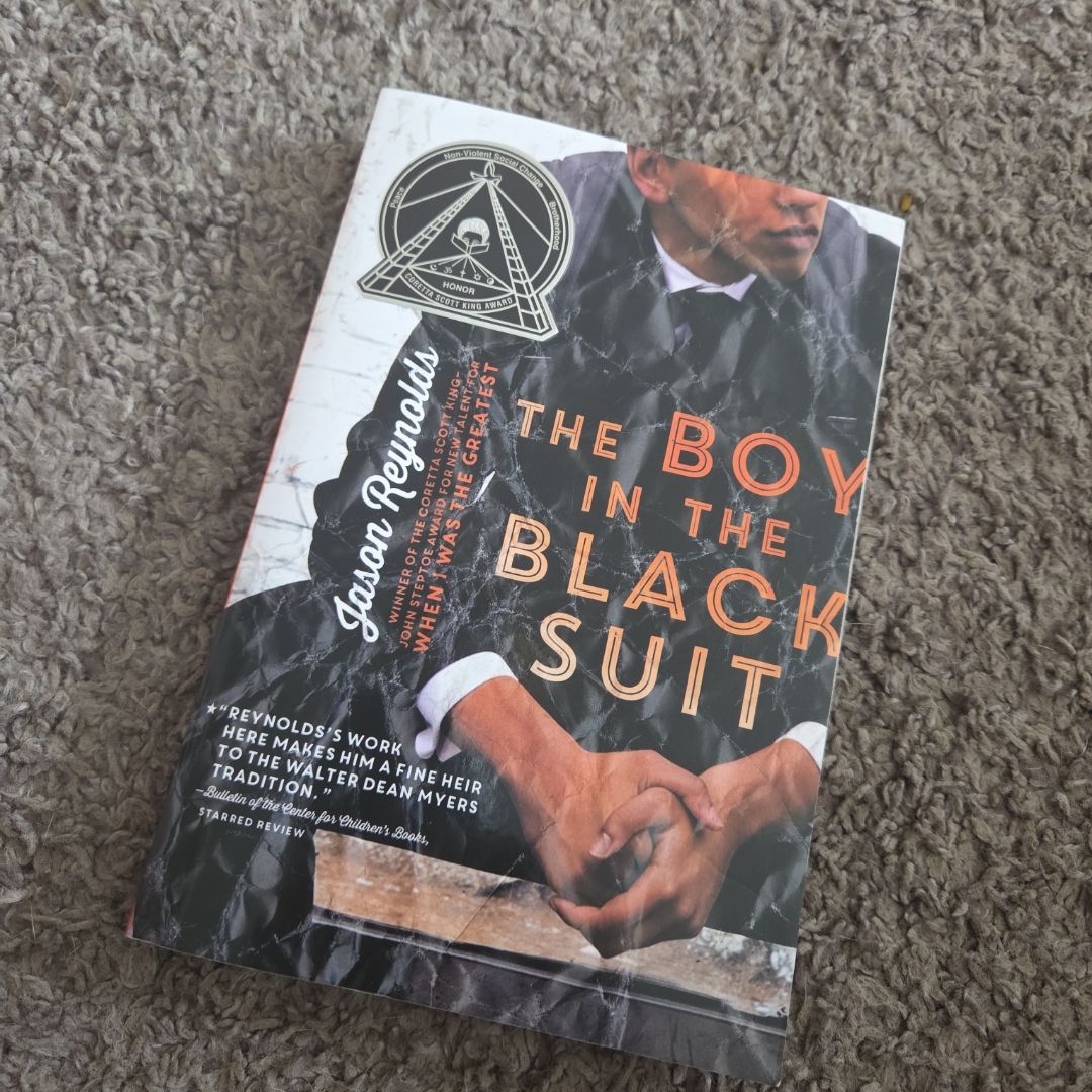 The Boy in the Black Suit