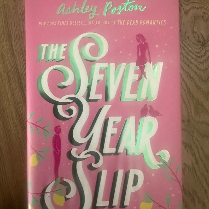 The seven year slip Fairyloot special edition signed by Ashley poston,  Hardcover