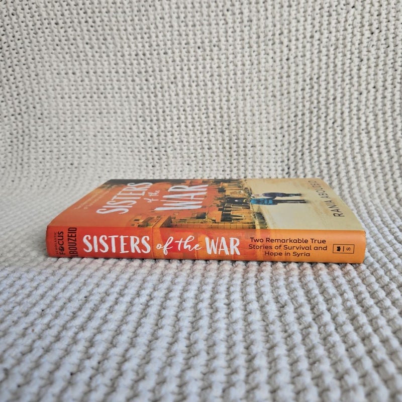 Sisters of the War: Life, Loss, and Hope in Syria (Scholastic Focus)