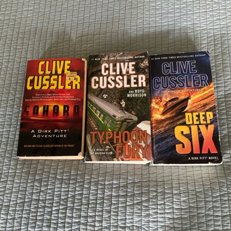 3 Clive Cussler Paperback Books