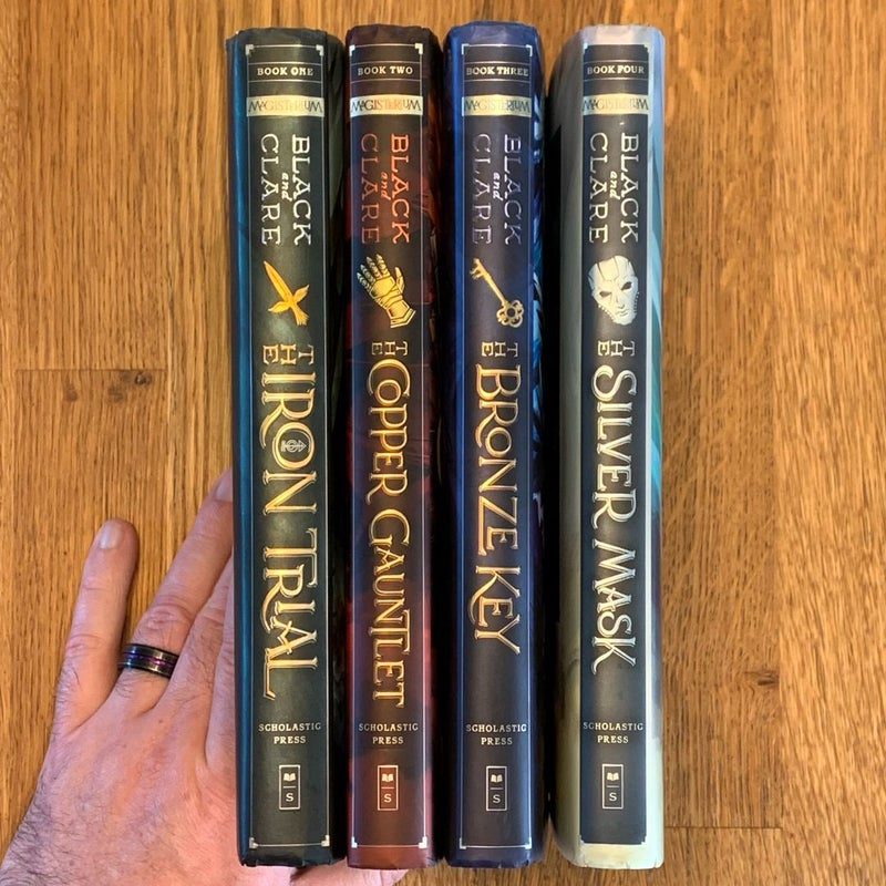 Magisterium, books 1-4 The Iron Trial / The Copper Gauntlet / The Bronze Key / The Silver Mask