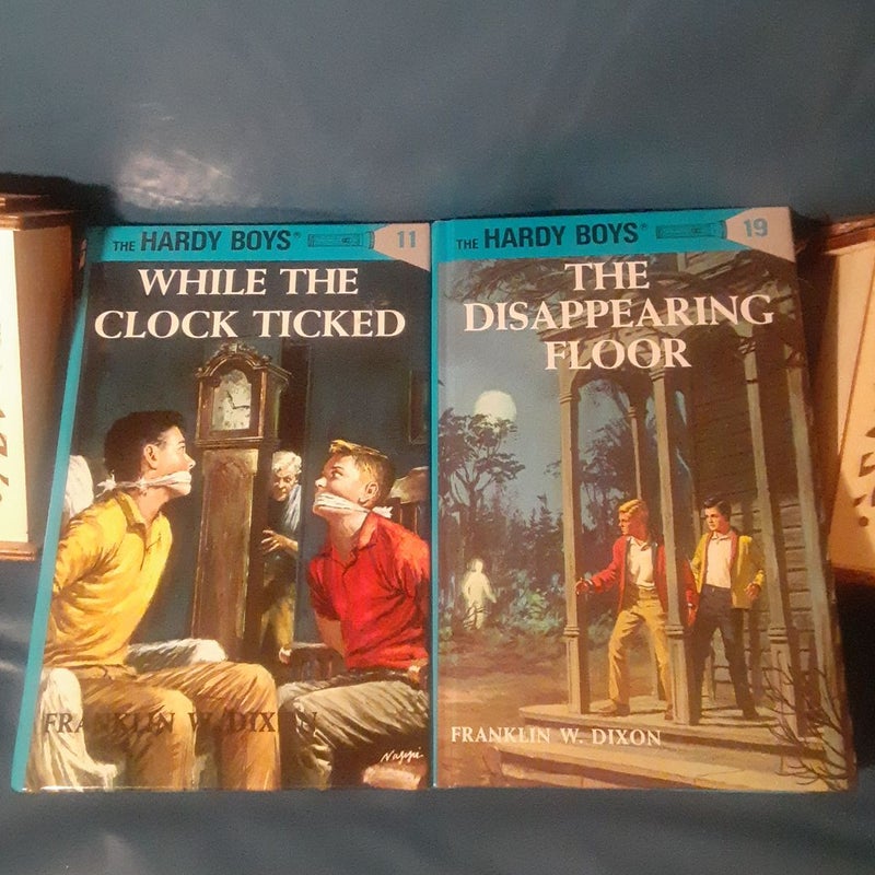 Hardy Boys books 6, 7, 11, 19, 26, 27 : the Shore Road Mystery, Secret of the Caves, While the Clock Ticked, Disappearing Floor, Phantom Freighter, Secret of Skull Mountain