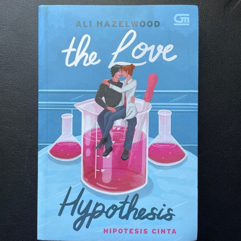 The Love Hypothesis Indonesian edition with matching bookmark