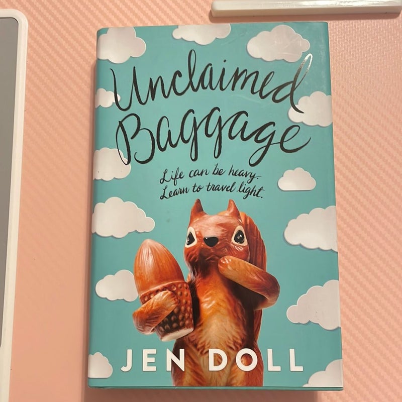 Signed! Unclaimed Baggage