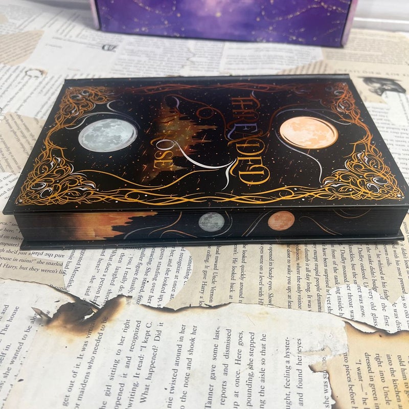 Moonlight Book Box Special Edition of Threaded by Tay Rose will ship in the box it arrived in.