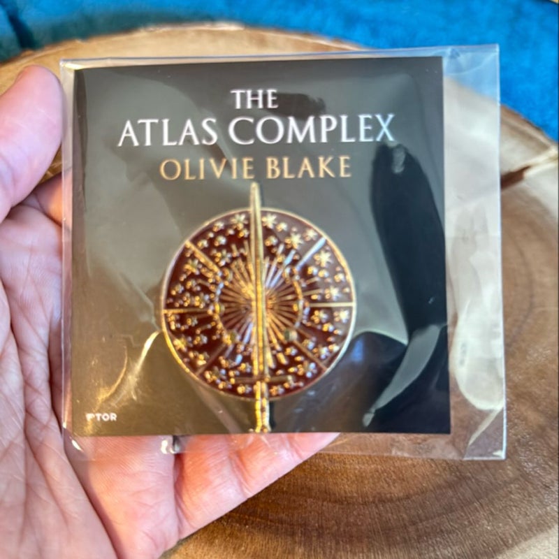 The Atlas Complex by Olivie Blake enamel pin (promotional item)