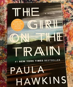 The Girl on the Train: A Novel Paperback  By Paula Hawkins VG