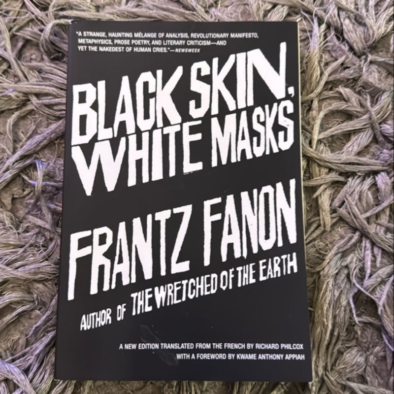 Black Skin, White Masks