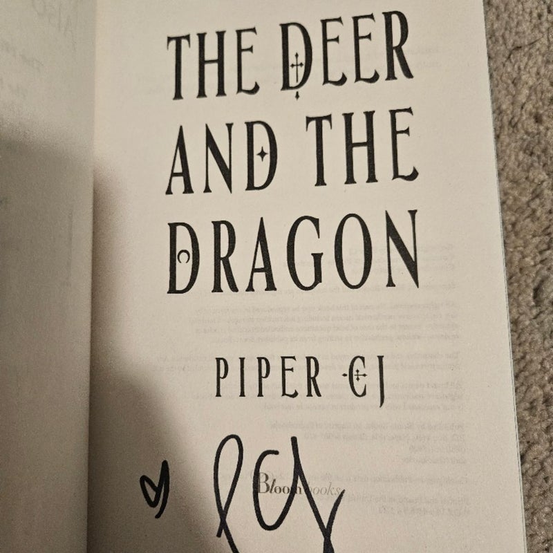 Signed The Deer and the Dragon with Overlays