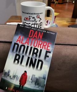 Signed copy double blind with matching coffee mug