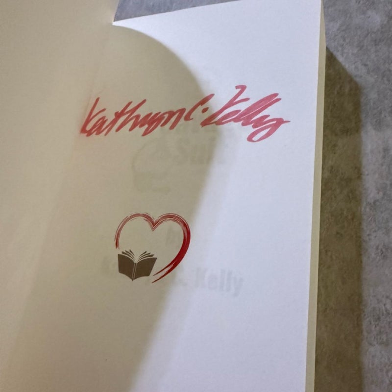 Signed Paperback - Savage Suit