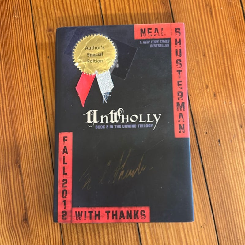 UnWholly (Numbered 464/500, Signed Special Edition)