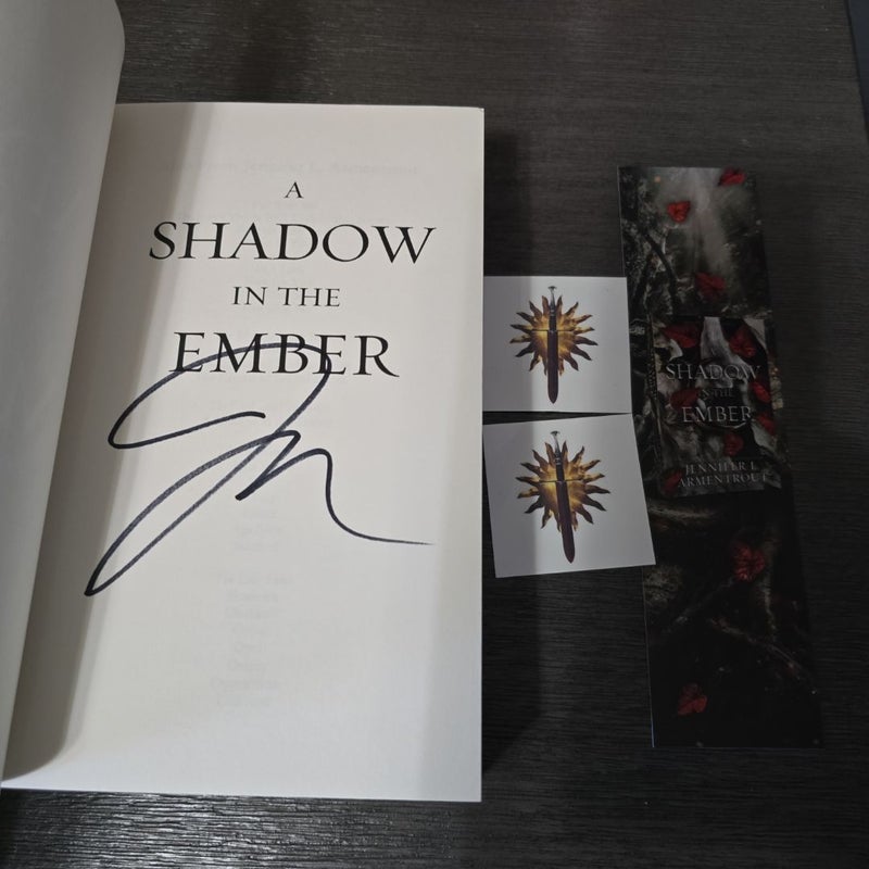 Signed A Shadow in the Ember with dagger