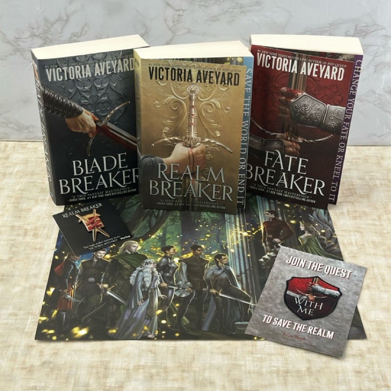 Realm Breaker trilogy with promo items