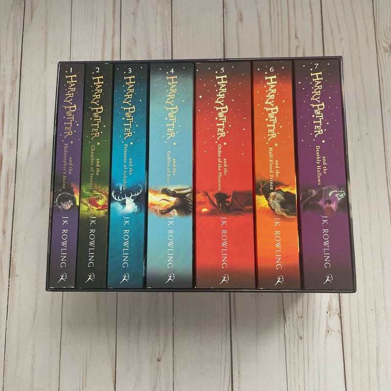 Boxed Set Harry Potter Paperback (Books 1-4) Scholastic copyright 1999 by  J. K. Rowling, Paperback