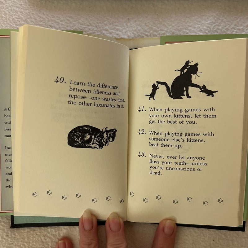 A Cat's Little Instruction Book