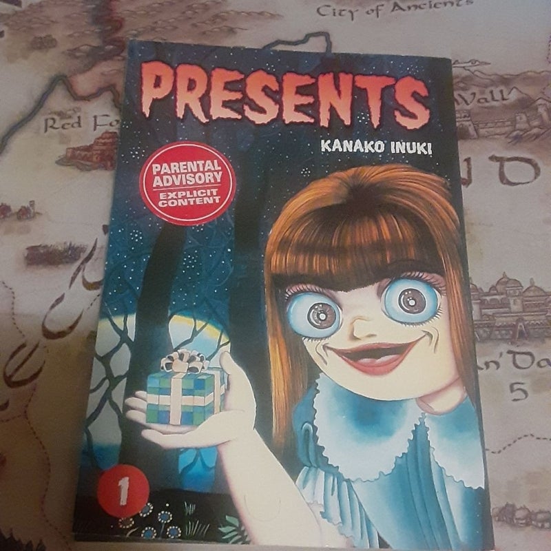 Presents #1 (DC Comics CMX manga 2007) Horror By Kanako Inuki. Small crease on front cover.
In English.  Rated mature for gore. Out of print. 
Published by CMX, DC COMICS short lived manga imprint. 
  Good shape =)