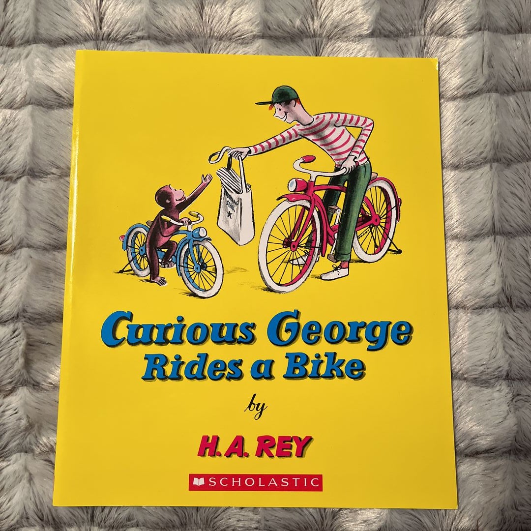 Curious George Rides a Bike