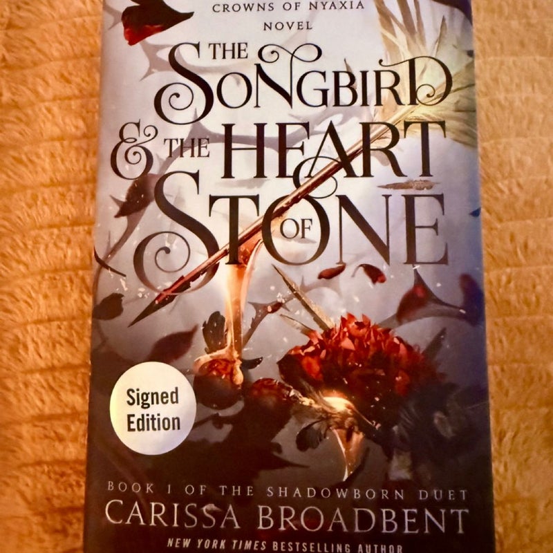 The Songbird and the Heart of Stone SIGNED