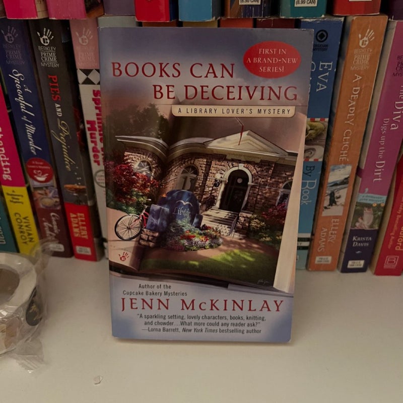 Books can be deceiving a library lovers mystery 1