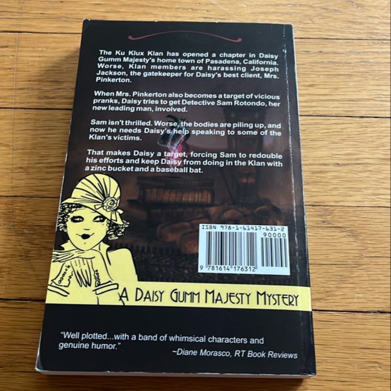 Dark Spirits (A Daisy Gumm Majesty Mystery, Book 7)