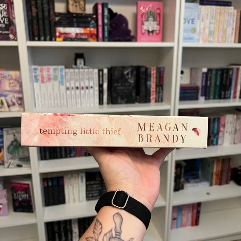 Tempting little thief by Meagan Brandy , Hardcover | Pangobooks