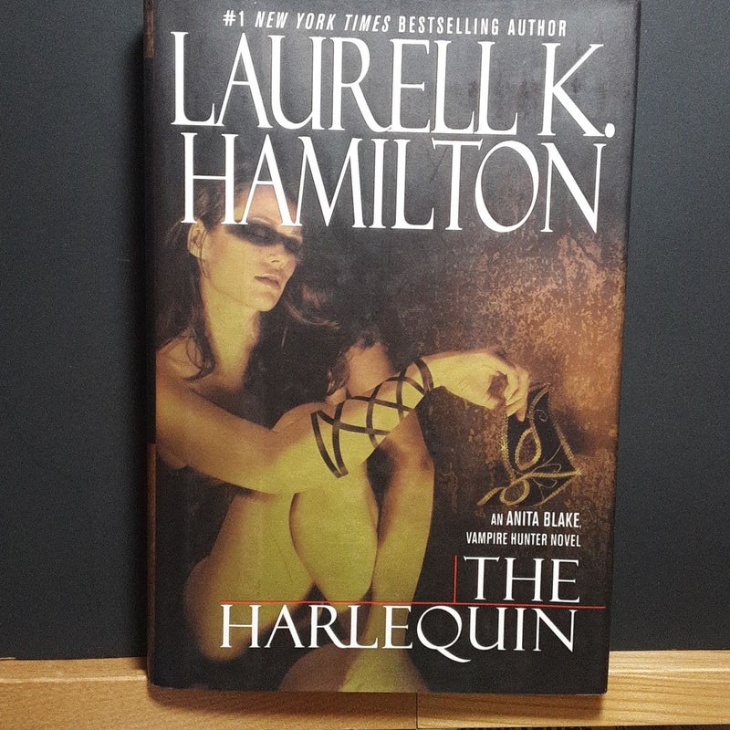 (First Edition) The Harlequin