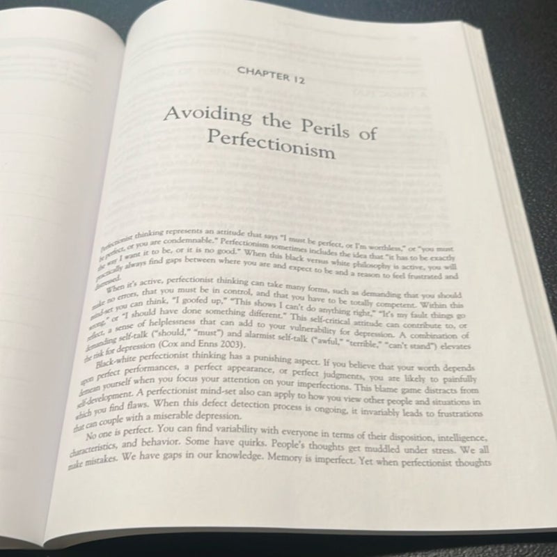 The Cognitive Behavioral Workbook for Depression