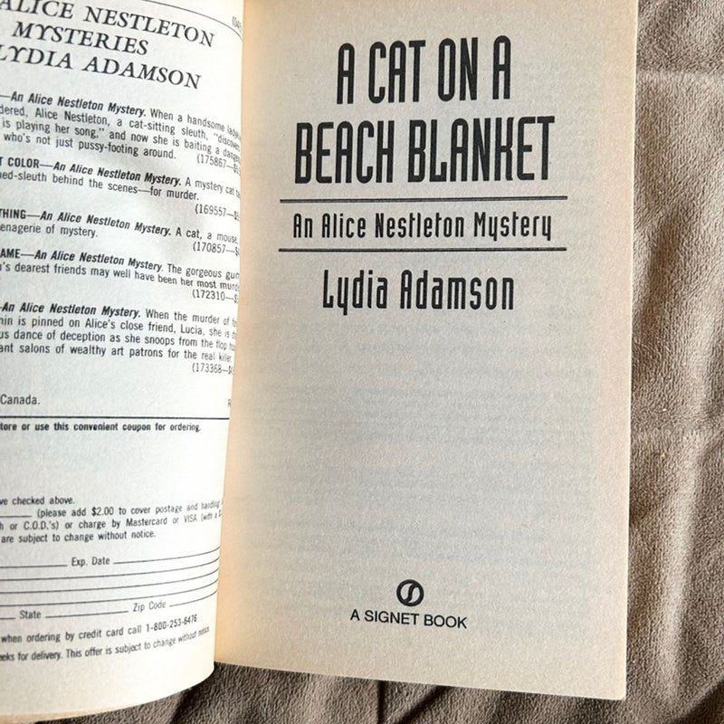 A Cat on a Beach Blanket  886