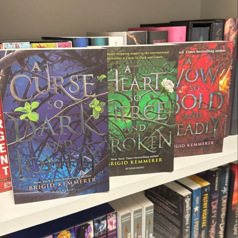 A Curse So Dark and Lonely Trilogy UK Covers 