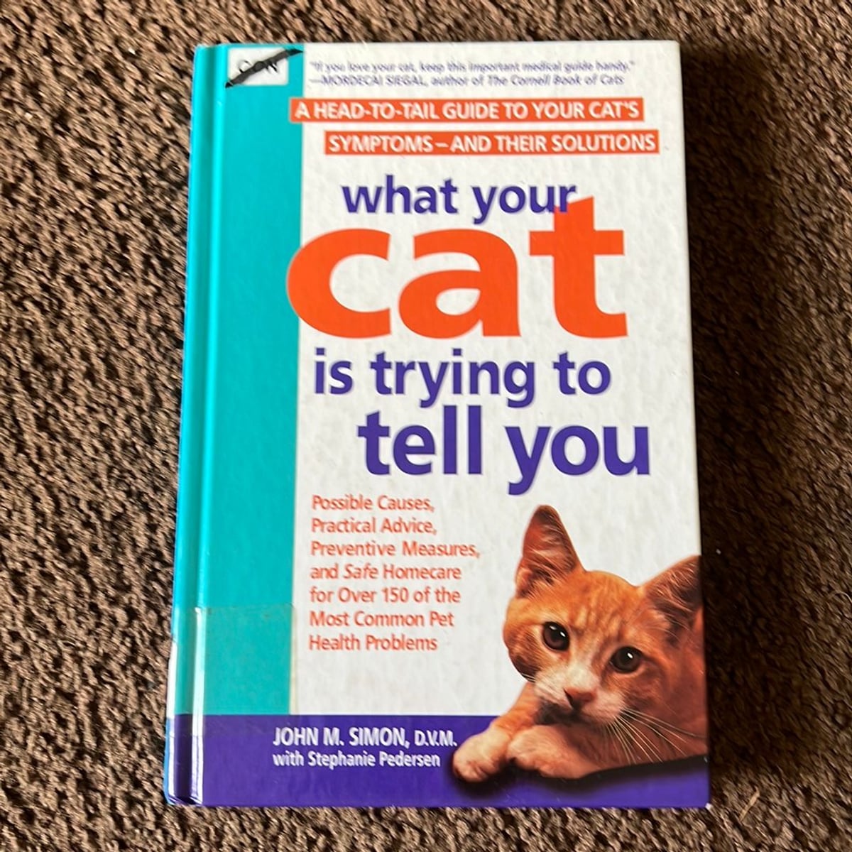 What Your Cat Is Trying to Tell You by John M. Simon