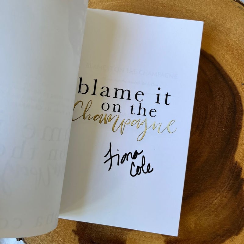 Blame It On The Champagne - Signed Cover to Cover