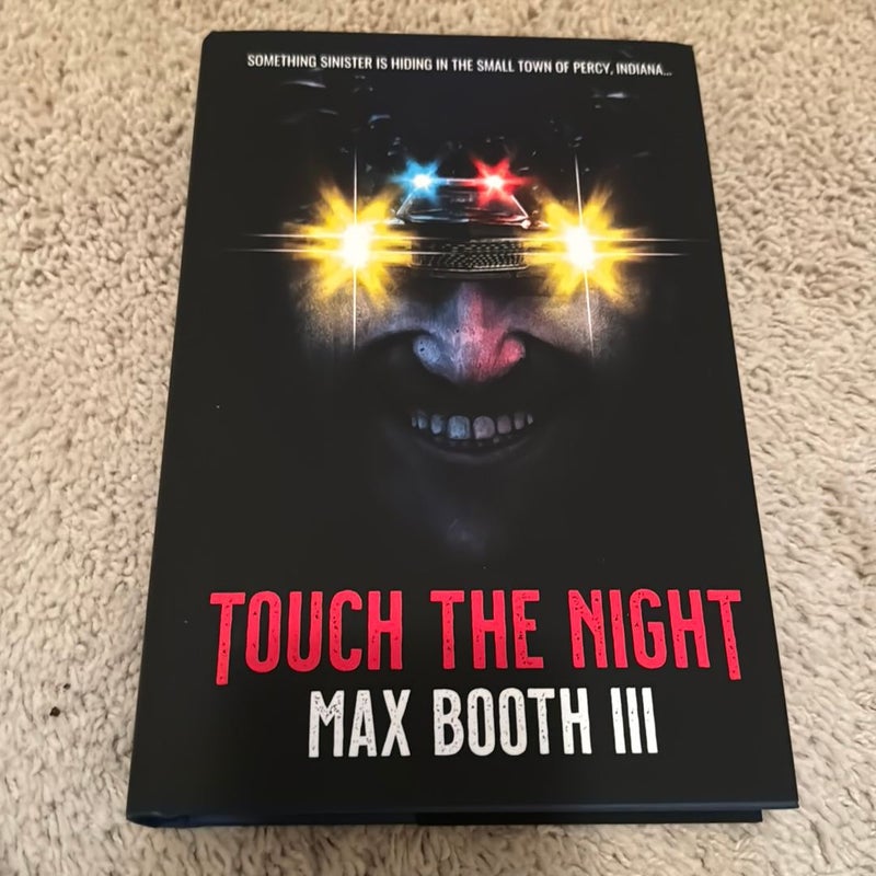 Touch the Night: signed and numbered 