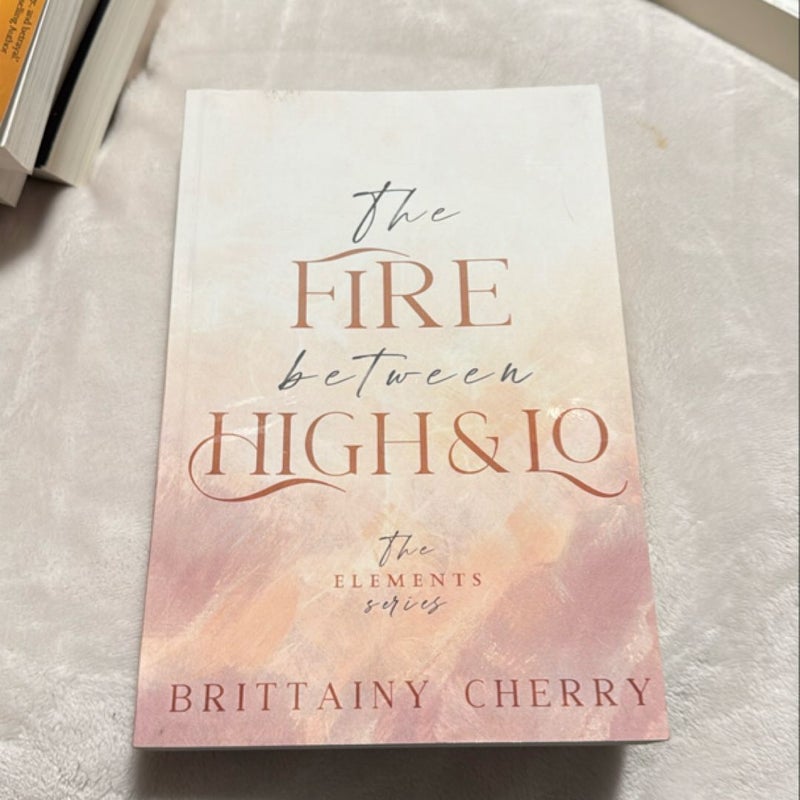 The Fire Between High and lo: Special Paperback Edition