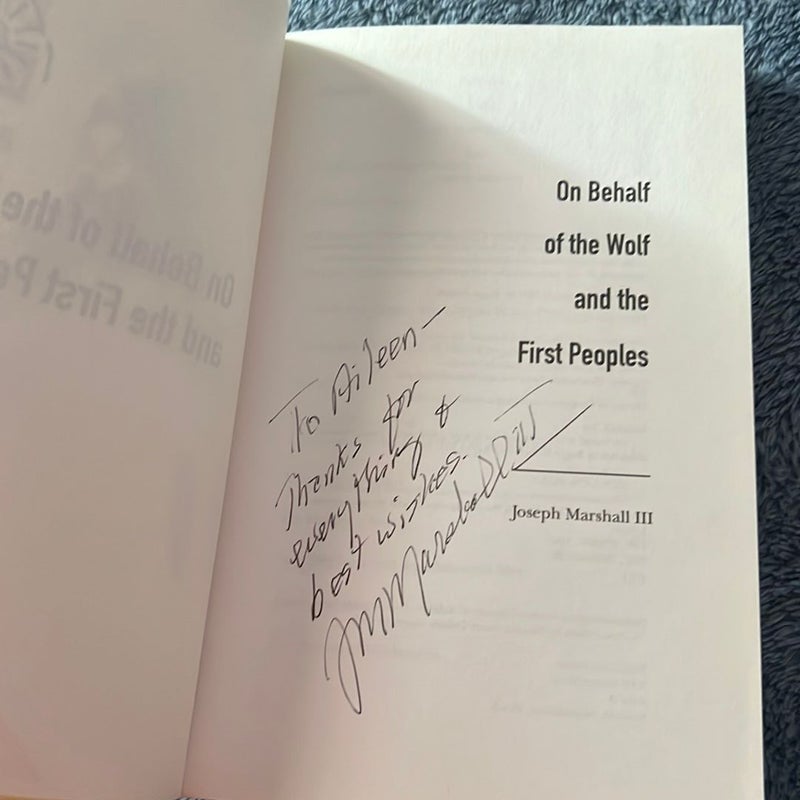 On Behalf of the Wolf and the First Peoples Signed 