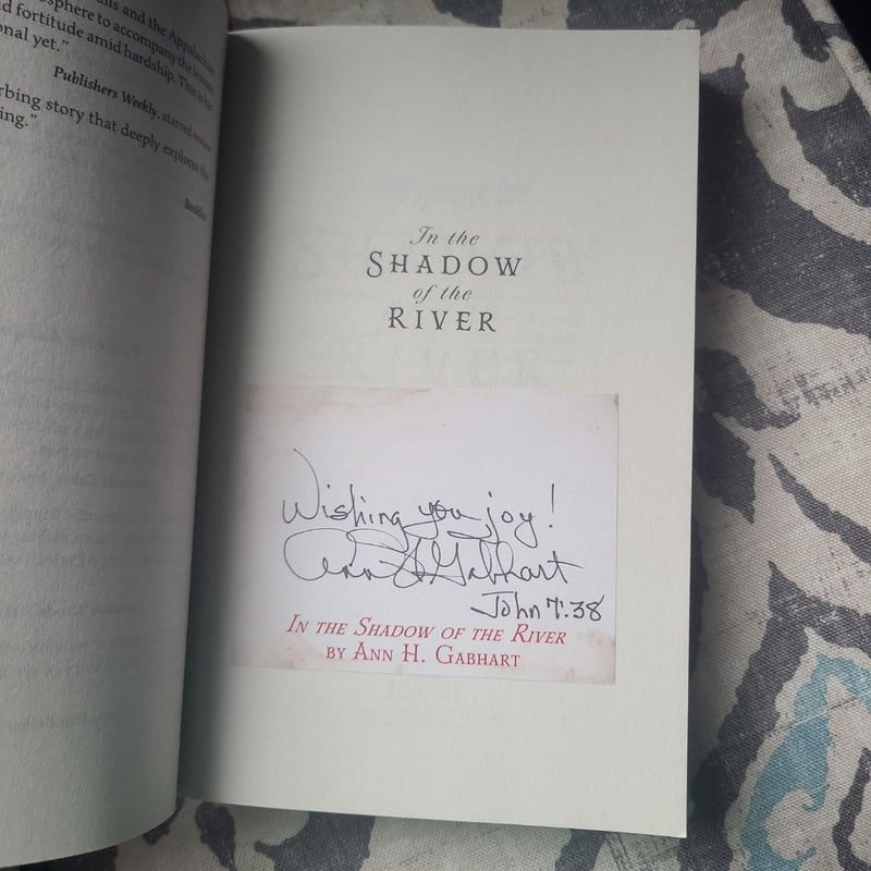 In the Shadow of the River signed 