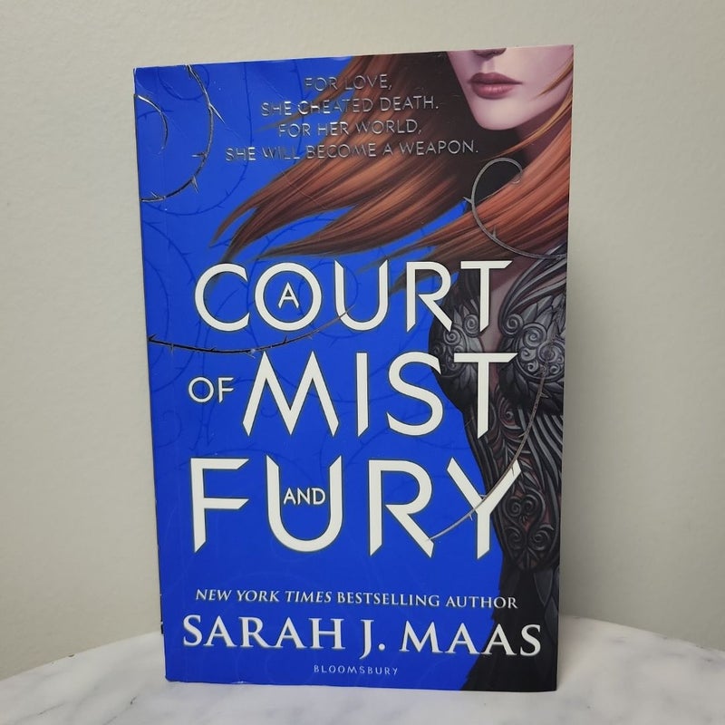 A Court of Mist hot and Fury first edition OOP