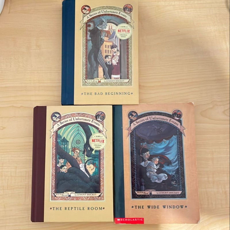 A Series of Unfortunate Events books #1, #2, and #3