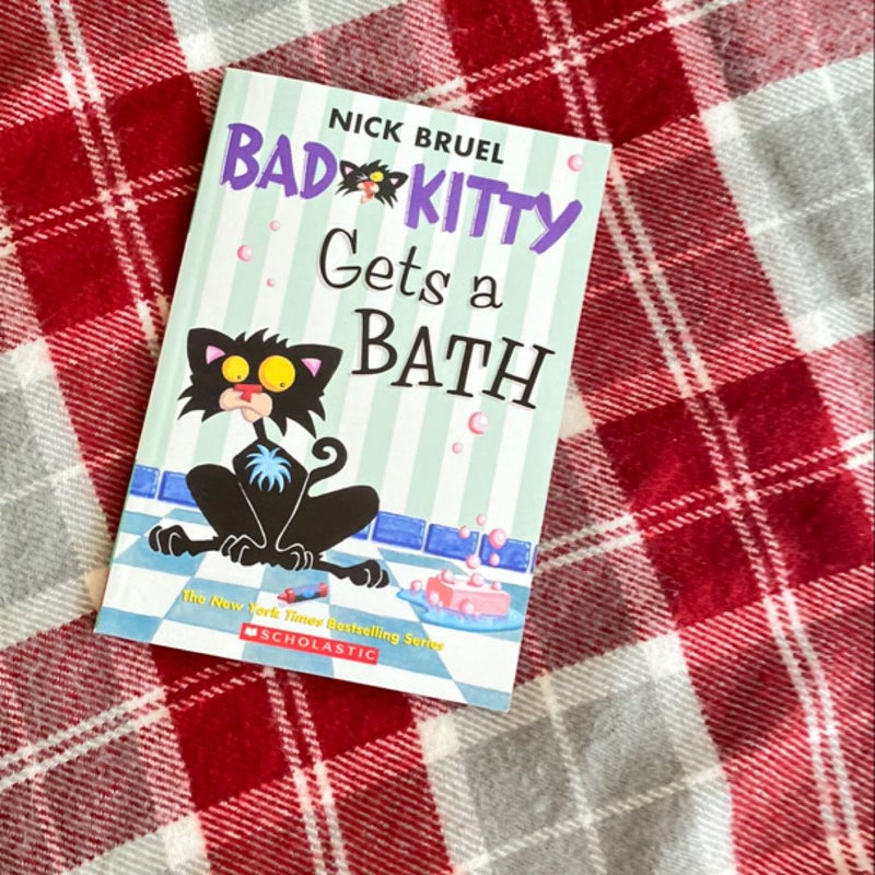 Bad kitty gets a bath