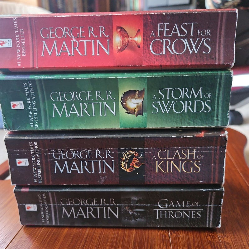 A Game of Thrones (HBO Tie-In Edition), A Clash of Kings, A Storm of Swords, and A Feast for Crows