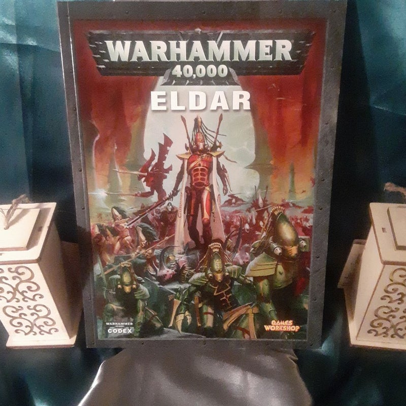 Warhammer 40k Codex Eldar 2010 paperback book Gamesworkshop. Small corner crease on cover. 84 pages long.  Good shape =0