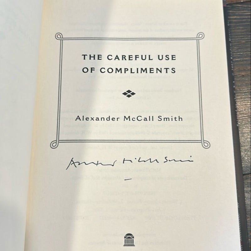 The Careful Use of Compliments (signed copy)