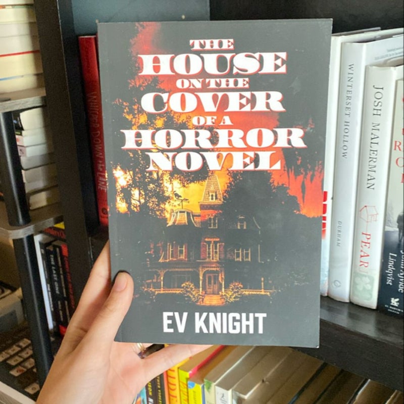 The house on the cover of a horror novel