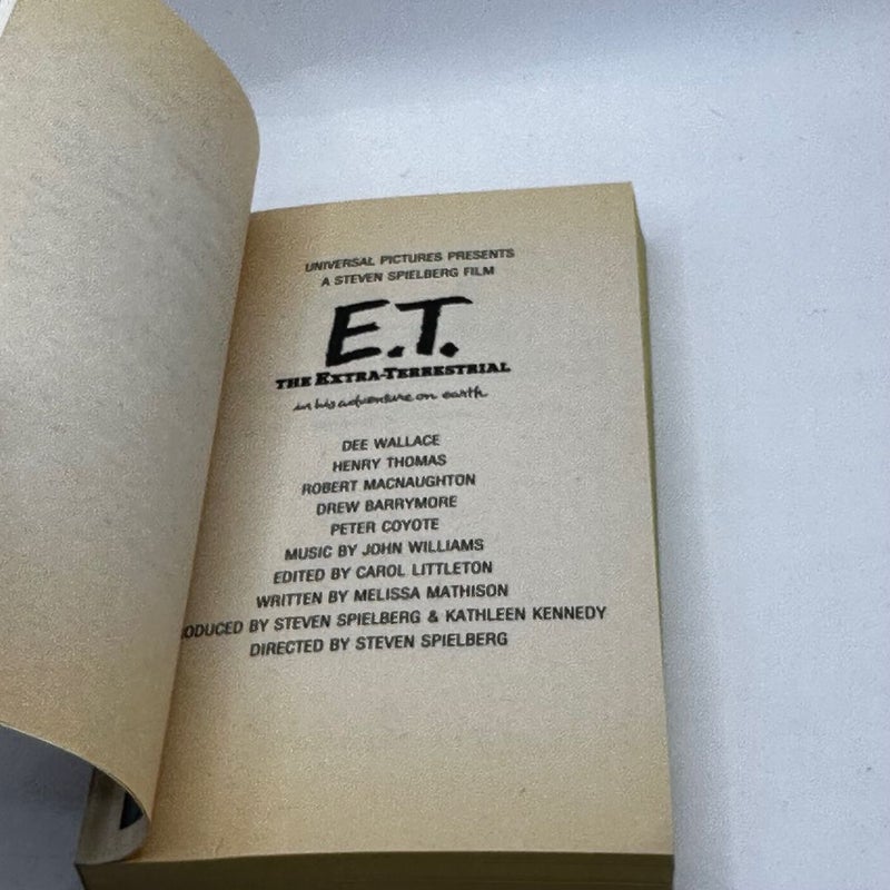 E. T.