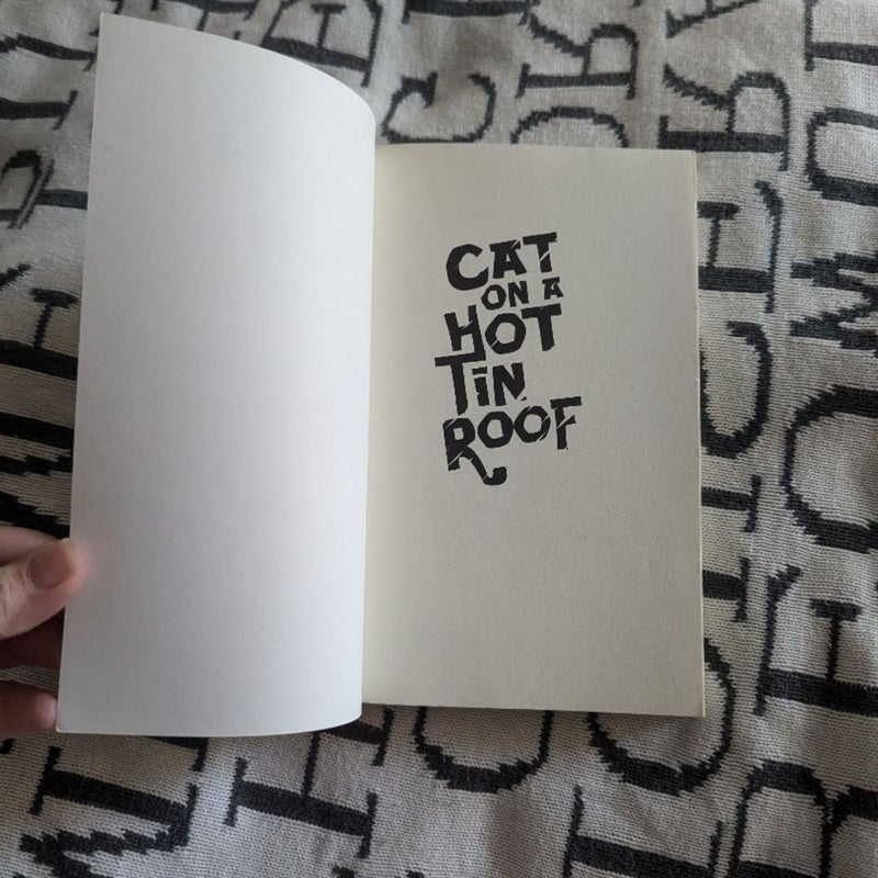 Cat on a Hot Tin Roof