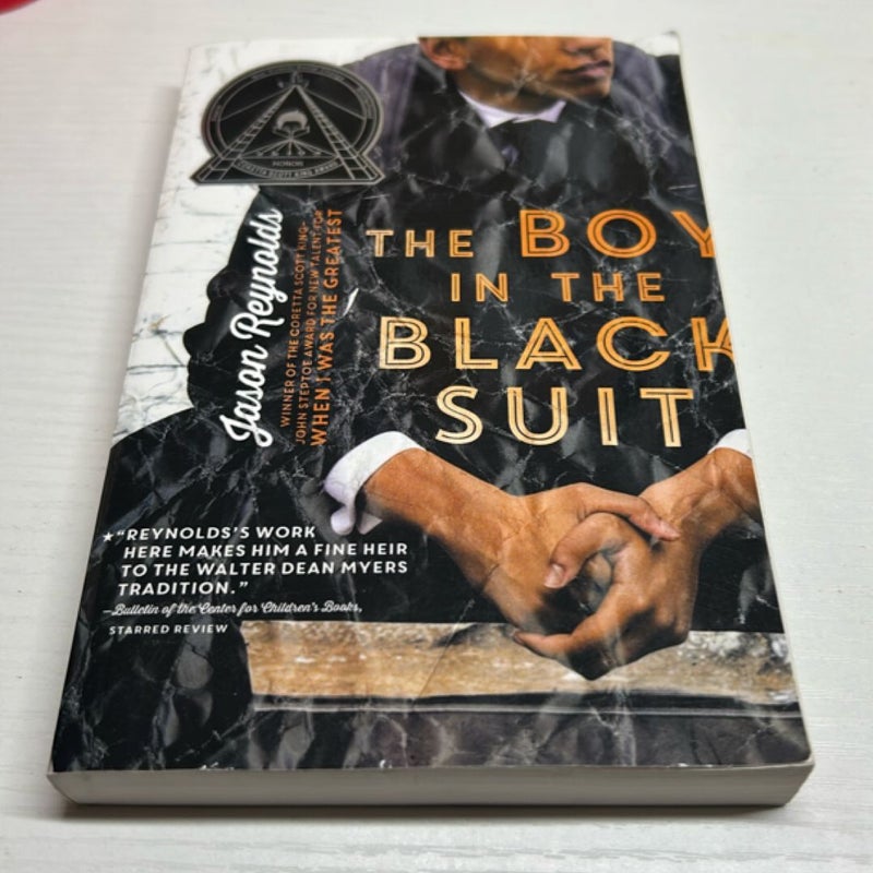 The Boy in the Black Suit