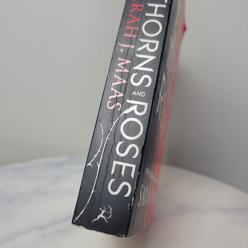 A Court of Thorns and Roses | 1st / 1st UK Paperback OOP