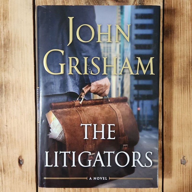 (First Edition) The Litigators