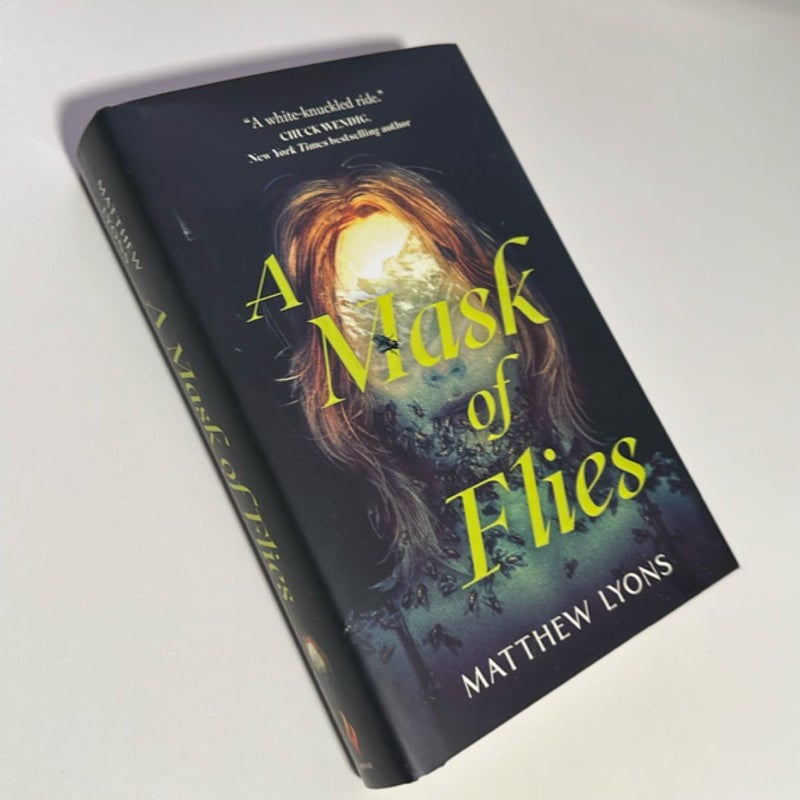 A Mask of Flies